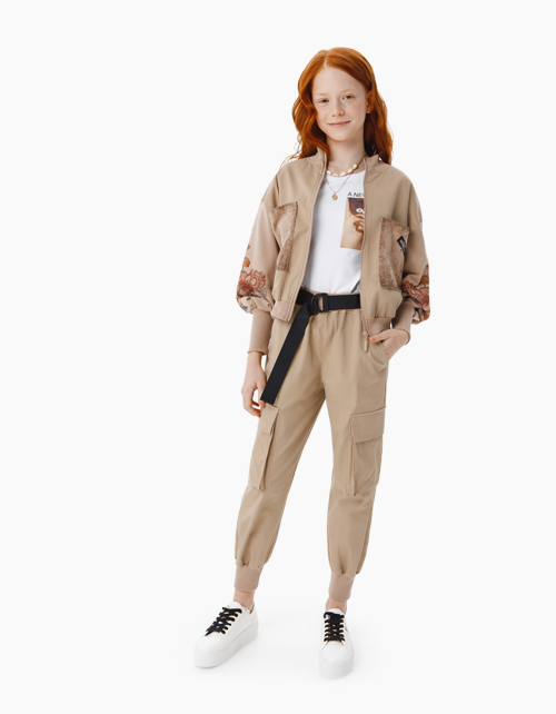 Светло-бежевые брюки для девочки Купить светло-бежевые брюки бренда Bellbimbo для девочки