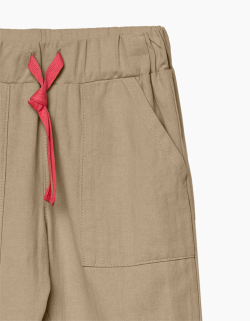 Купить свободные бежевые брюки для мальчика