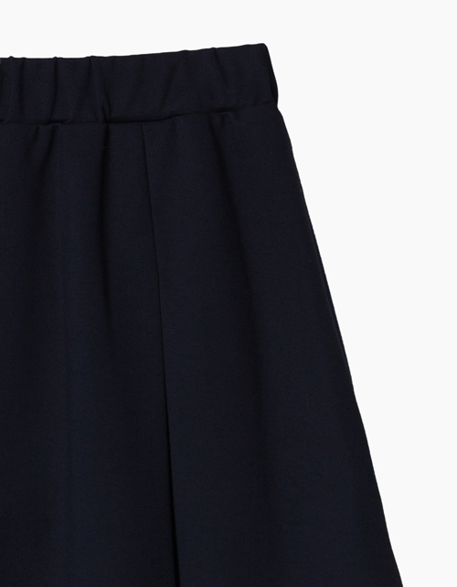 Купить темно-синюю юбку трапециевидного силуэта