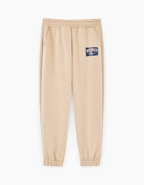 Бежевые брюки-джоггеры для мальчика Бежевые брюки-джоггеры для мальчика