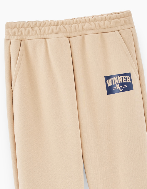 Бежевые брюки-джоггеры для мальчика Бежевые брюки-джоггеры для мальчика