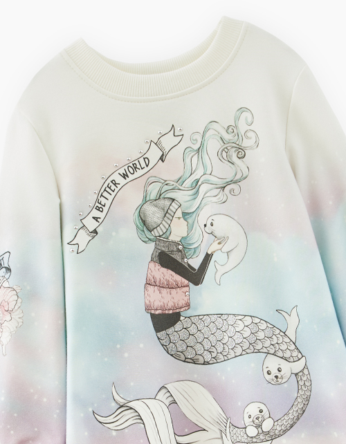 Молочное платье со стильным принтом