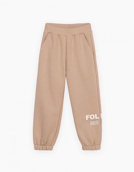 Бежевые брюки-джоггеры для девочки