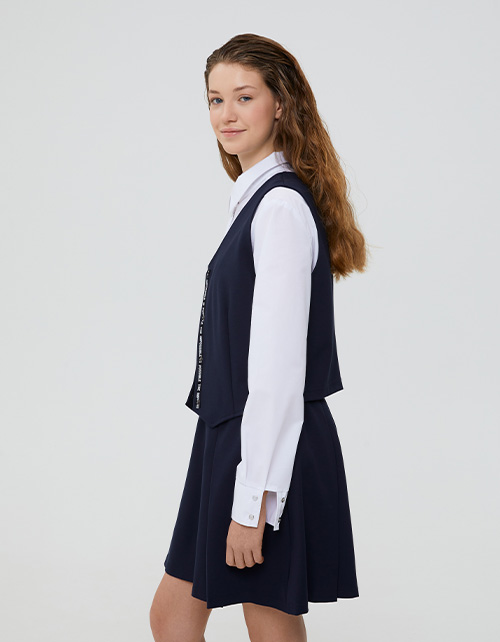 Укороченный тёмно-синий жилет для девочки Укороченный тёмно-синий жилет для девочки