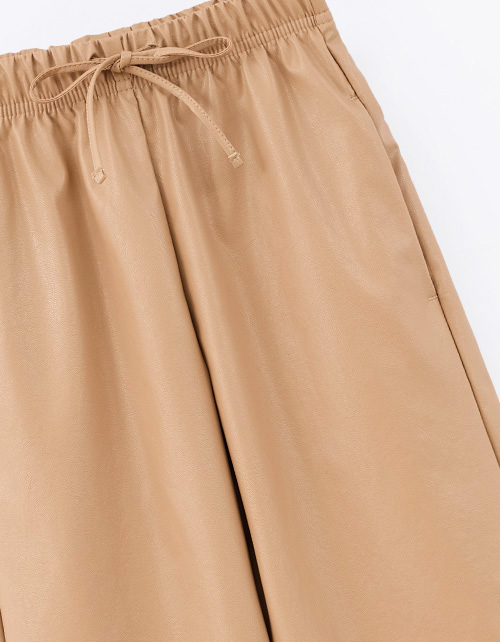 Брюки из эко-кожи для девочки