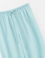 Светло-бирюзовые брюки-аладдины для девочки